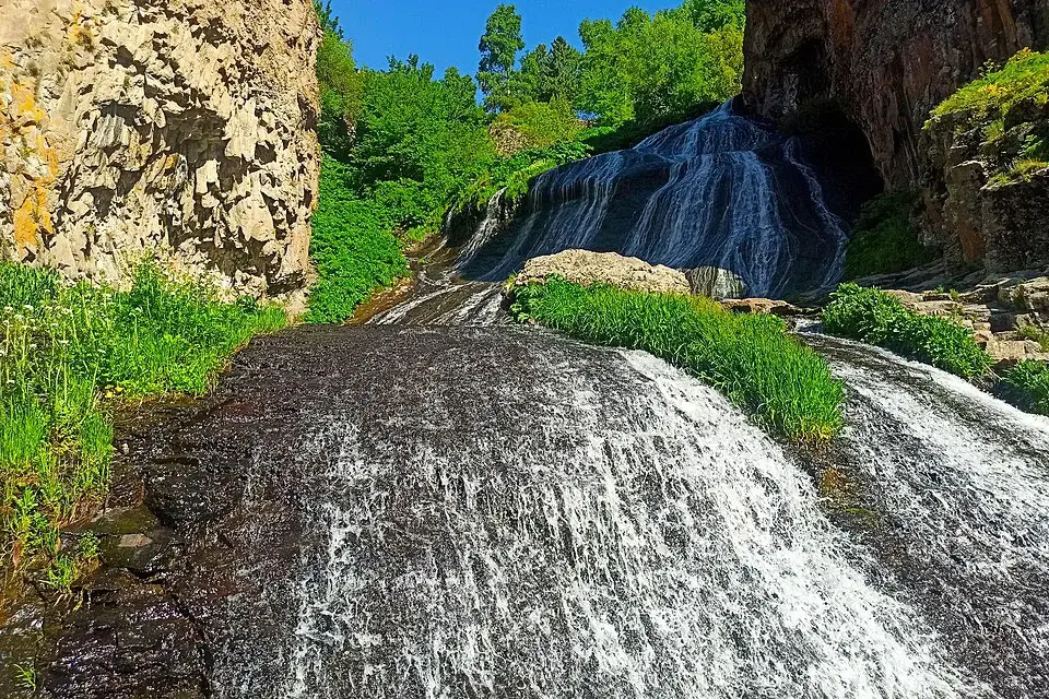 Multi-tiered cascade of Jermuk Waterfall from below