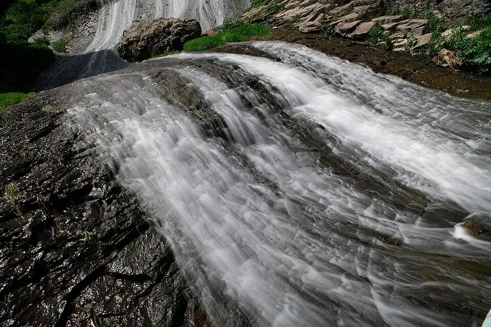 Streams of Jermuk Waterfall flowing down the rock steps