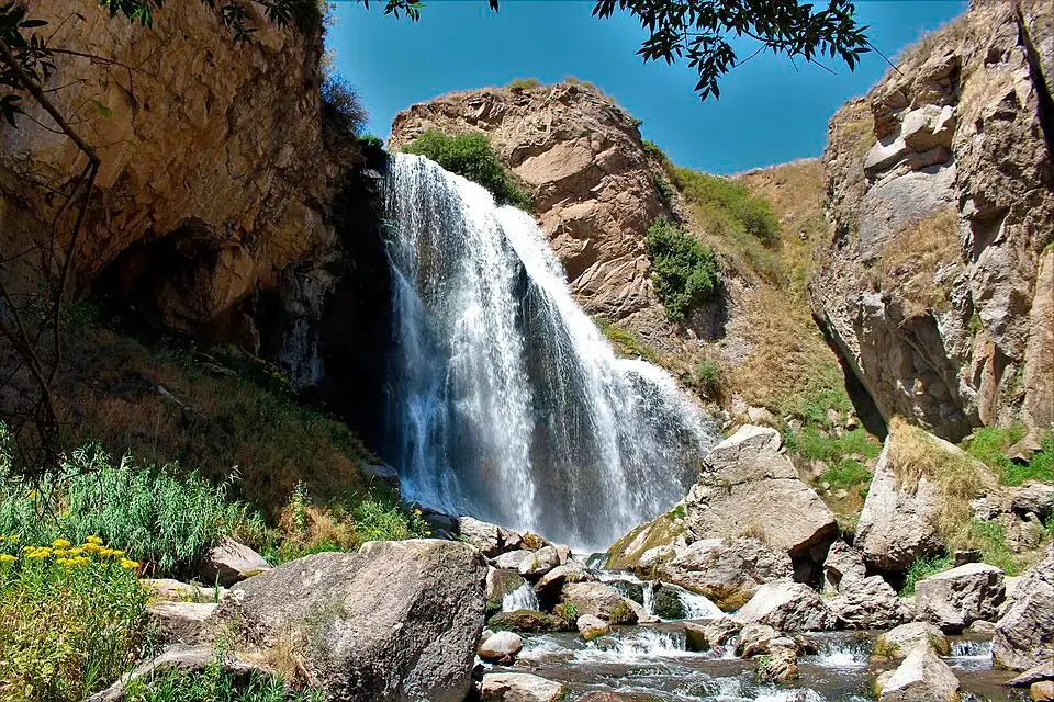 Trchkan Waterfall in spring with strong water flow among the rocks