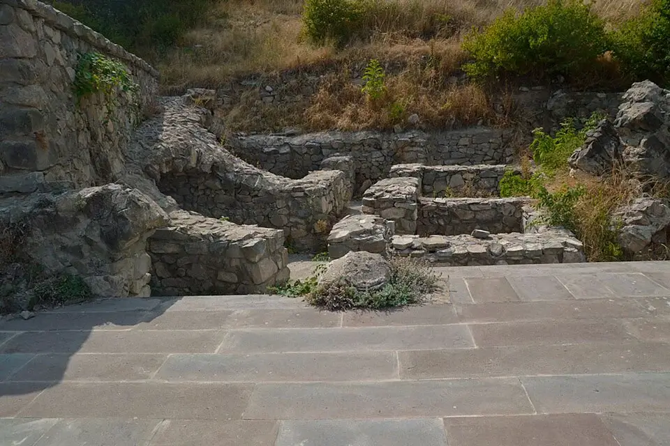 Ruined stone walls and foundations inside Halidzor Fortress