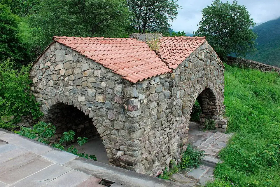 Stone building inside Halidzor Fortress, former monastery complex near Kapan