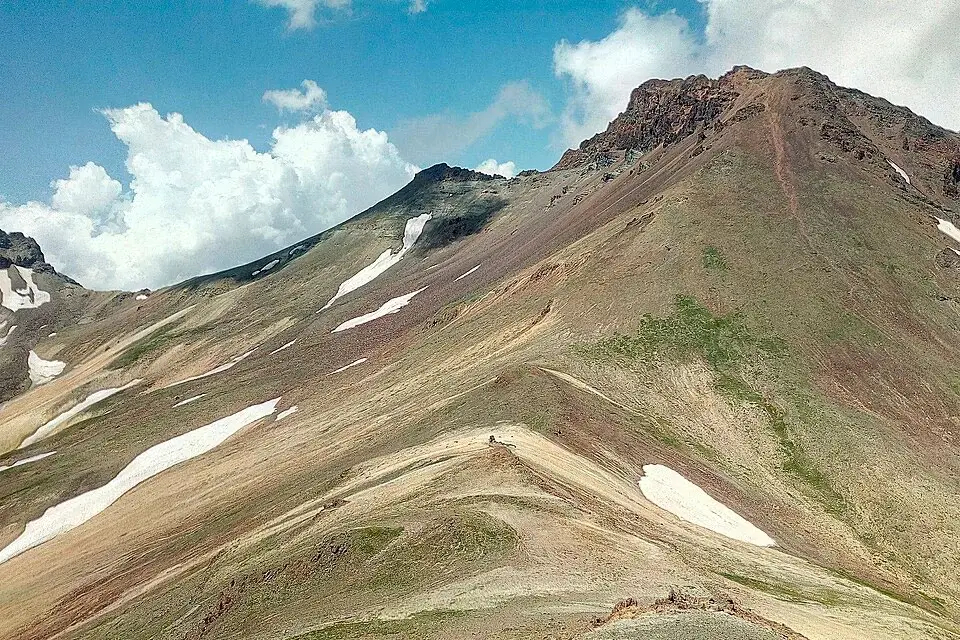 A summit trail on Mount Aragats from the Lake Kari side.