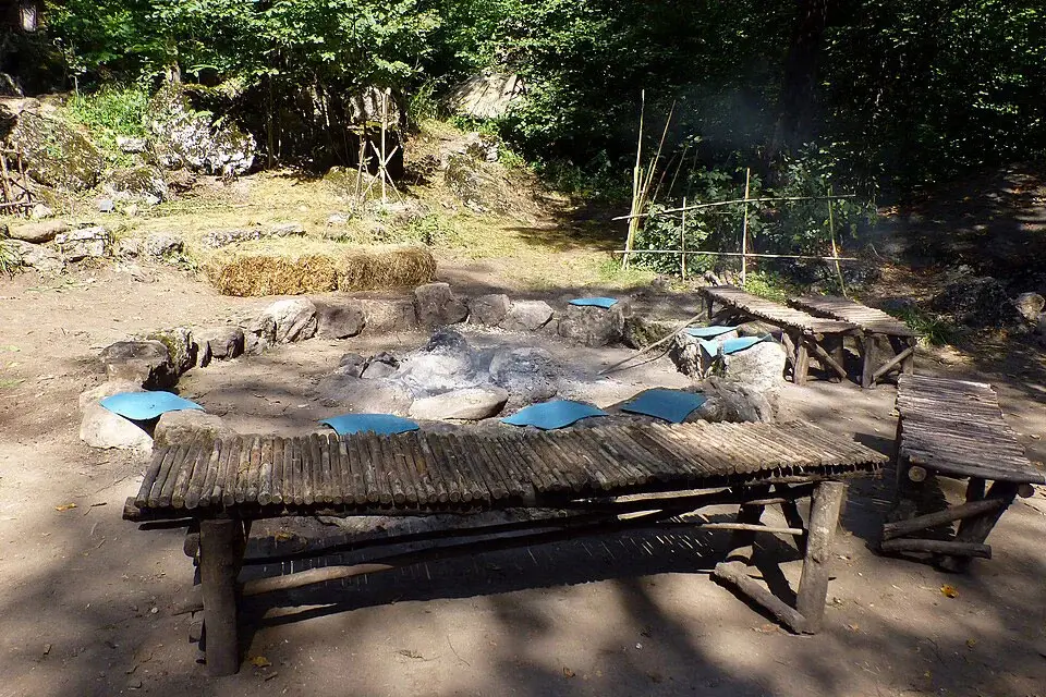 Rustic picnic area at Lastiver camp in the forest