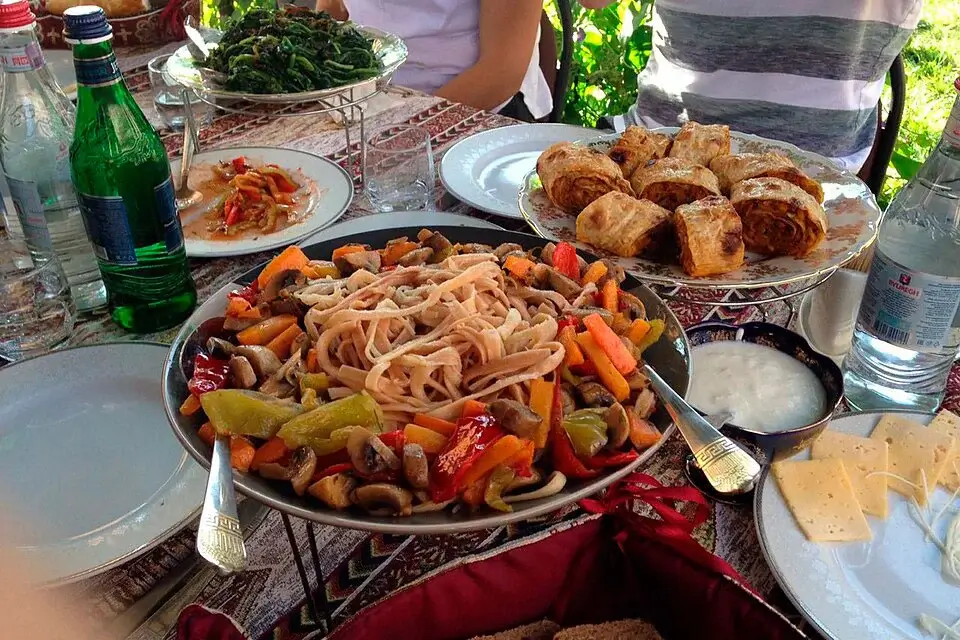 Traditional Armenian cuisine with lavash, khorovats, tolma, cheese and fresh herbs