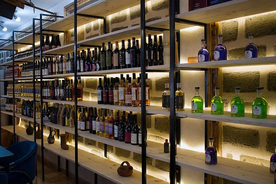 Shelves with bottles of Armenian wine in a shop